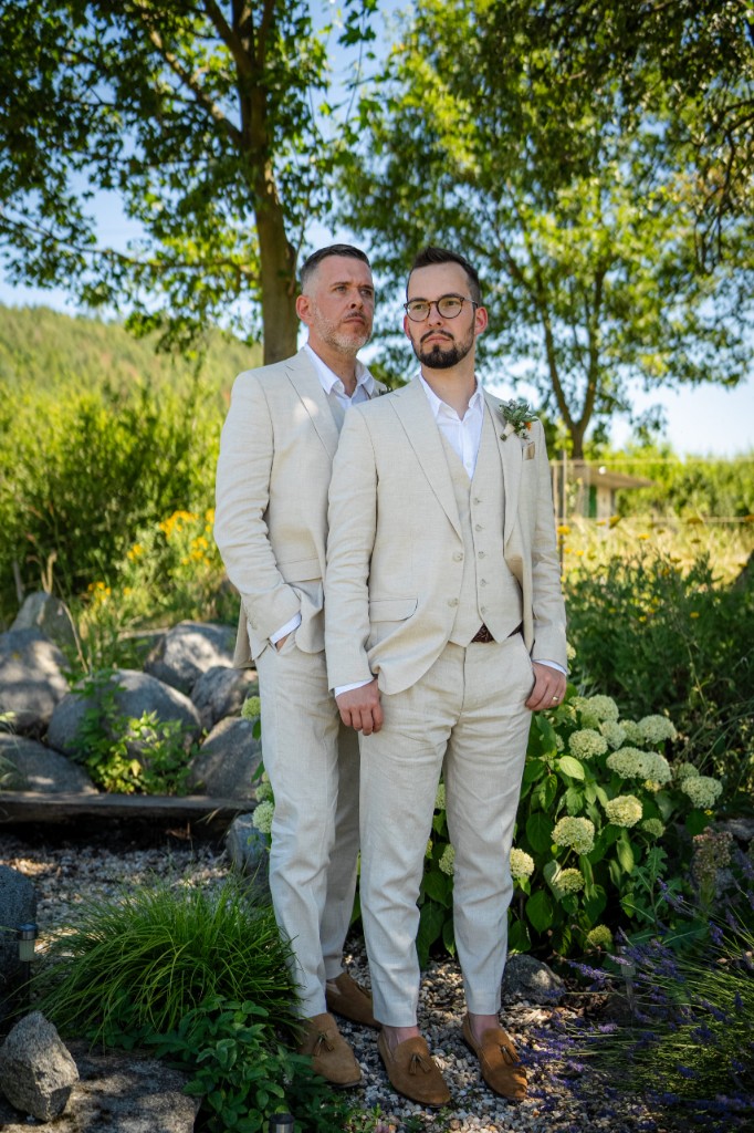Full-length portrait on a garden path with lavender and rockery