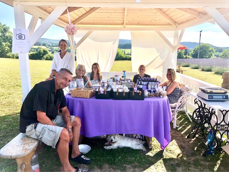 The Royal Lavender team at a table on the farm